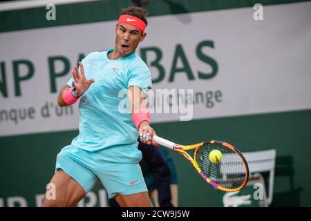 Paris, France. 28th Sep, 2020. Rafael Nadal returns the ball during the men's singles first round match between Rafael Nadal of Spain and Egor Gerasimov of Belarus at French Open tennis tournament 2020 at Roland Garros in Paris, France, Sept. 28, 2020. Credit: Aurelien Morissard/Xinhua/Alamy Live News Stock Photo