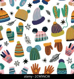 Cute vector seamless pattern of winter clothing, hats, mittens and gloves. Freehand drawn doodle elements.  Stock Vector