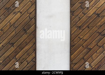 wooden wall texture with vertical concrete insert. wood and concrete modern Design of wall. Backround with copy space. Stock Photo
