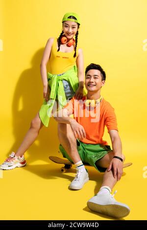 Young couples portrait of skateboarding Stock Photo