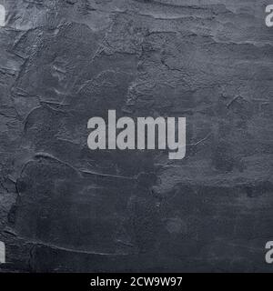 Dark black concrete wall texture background. Natural black slate concrete  background pattern. Stock Photo