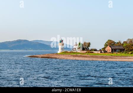 View of the Corran Point Lighthouse and Lodge on the west side of the Corran Narrows of Locrows of Loch Linnhe, in Scottish Highlands. Stock Photo