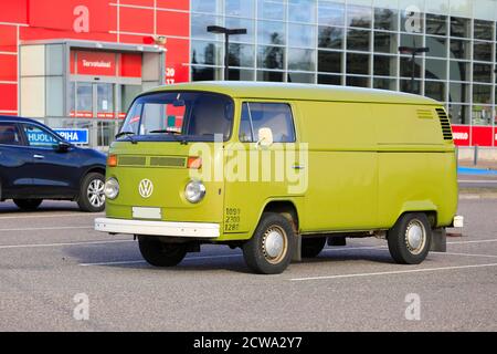 Classic, olive green Volkswagen Type 2 camper van on supermarket parking area in Salo, Finland. September 22, 2019. Stock Photo