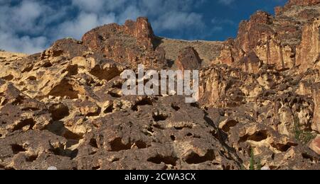 Volcanic rhyolite rock formations in Leslie Gulch near Owyhee Lake, Mahogany Mountain Caldera, High Desert Region, Oregon, USA Stock Photo