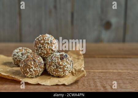 Healthy organic energy granola bites with nuts, cacao, sesame and honey - vegan and vegetarian raw snack Stock Photo