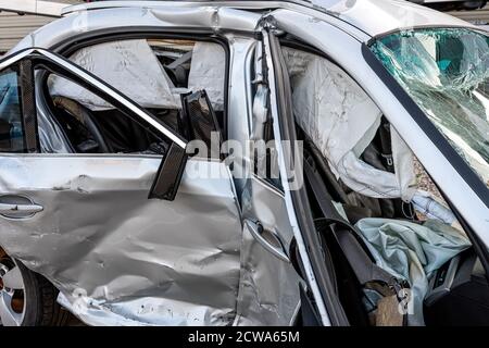 damaged vehicle closeup after a heavy crash, car accident, insurance concept Stock Photo