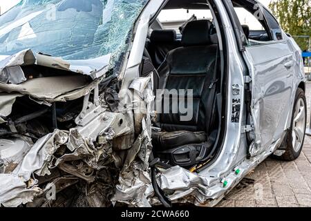 damaged vehicle closeup after a heavy crash, car wreck, insurance concept Stock Photo