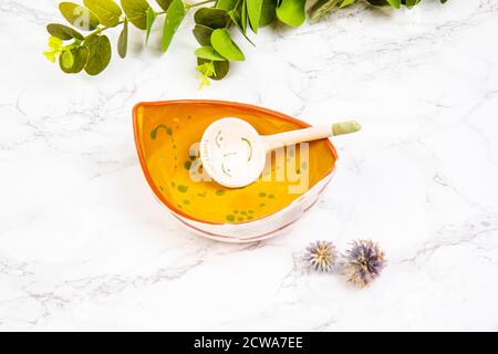 colorful handmade ceramic plates on marble table Stock Photo
