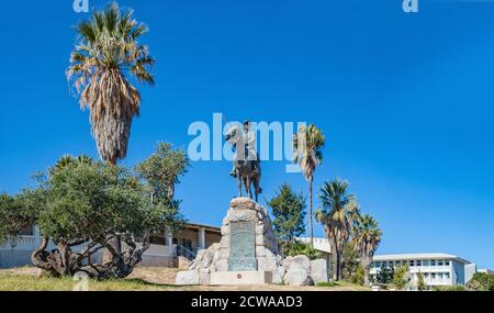 WINDHOEK, SOUTH AFRICA - JUNE 09, 2012: View of the Reiterdenkmal in Windhoek. The Alte Feste and Windhoek High School buildings are visible Stock Photo