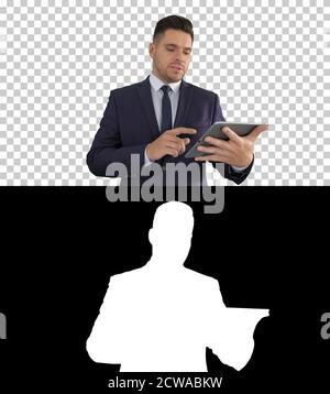 Businessman presenting from the tablet, Alpha Channel Stock Photo
