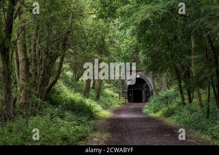 Entrance to one of the Kelmarsh tunnels, disused railway tunnels, Brampton Valley Way, Northamptonshire, England Stock Photo