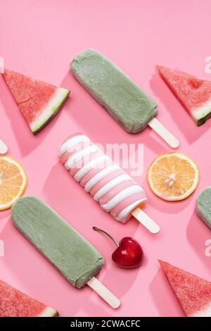 Different kinds of fruit and a variety of Popsicle Stock Photo