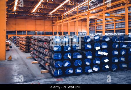 Round Bar Stacking Rack Pack of steel round bar stack in layer inside large distribution ...