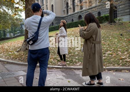 Serbia, Oct 7, 2019: Asian lady photo session at Kosovska Street in Belgrade Stock Photo