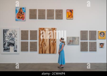 London, UK. 29th Sep, 2020. Objects of Desire, 2016-2020, paintings and text - Gagosian King's Cross gallery hosts a solo show by African American artist Meleko Mokgosi. Credit: Guy Bell/Alamy Live News Stock Photo