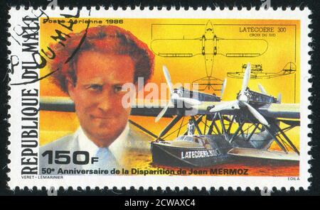 MALI - CIRCA 1986: stamp printed by Mali, shows aircraft and Jean Mermoz, circa 1986 Stock Photo