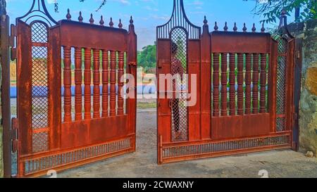 An old iron gate in front of a house in Jaipur, India. Stock Photo