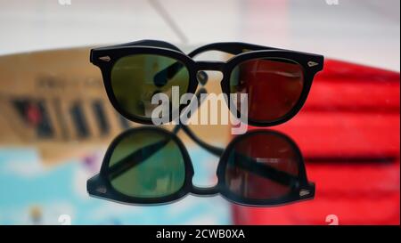 Close up of sunglasses on the table Stock Photo