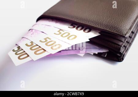 500 Euro money in brown wallet. Cash of euro currency. Bundle of Euro money. Europe money Stock Photo