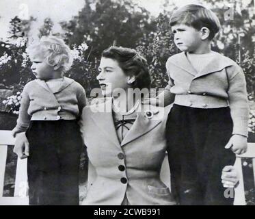 Photograph of Queen Elizabeth II with Prince Charles and Prince Andrew at Balmoral Castle. Stock Photo