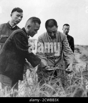 Hua Guofeng, inspecting a collective farm. (1921 - 2008) aged 37 in 1958. Chinese politician who served as Chairman of the Communist Party of China and Premier of the People's Republic of China, 1976 - 1982 Stock Photo