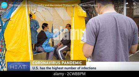 Indian television report on the spread of the Corona Virus in New York, USA. March 2020 Stock Photo