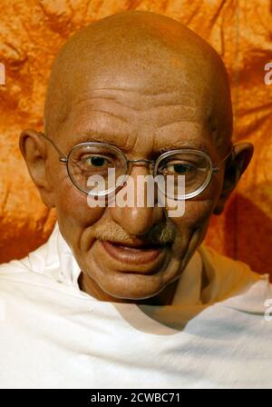 Waxwork statue depicting Mahatma Gandhi (1869 - 1948); Indian lawyer, anti-colonial nationalist, and political ethicist, who employed nonviolent resistance to lead the successful campaign for India's independence from British Rule, and in turn inspired movements for civil rights. Stock Photo
