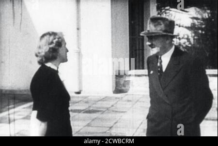Adolf Hitler and Eva Braun, Berchtesgaden, Bavaria, Germany, c1936-1945. Eva Braun came to live with Hitler at the Berghof at his home in the Bavarian Alps in 1936. They were married in his bunker in Berlin on 29 April 1945 in the closing days of World War II before committing suicide the following day. The photographer is unknown.