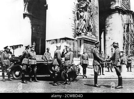 German officers at the Arc de Triomphe during the victory parade, Paris, June 1940. Paris fell to the Germans on 14 June 1940. The photographer is unknown. Stock Photo