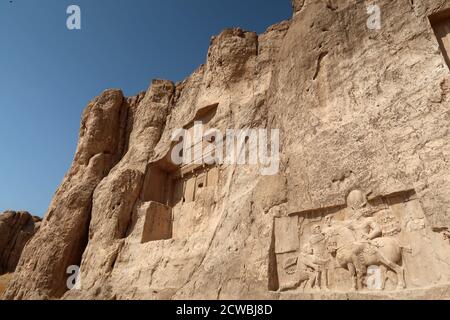 Photograph taken of the triumph relief of Shapur I, the most famous Sasanian rock relief at Naqsh-e Rostam. Stock Photo