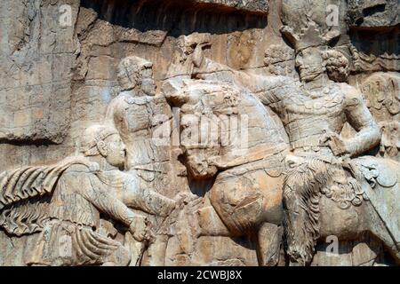 Photograph taken of the triumph relief of Shapur I, the most famous Sasanian rock relief at Naqsh-e Rostam. Stock Photo