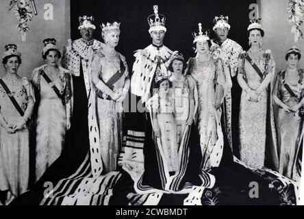 Black and white photograph of the British Royal Family on the day of the coronation of King George VI of the United Kingdom (1895-1952; King from 1936), on 12 May 1937. Stock Photo