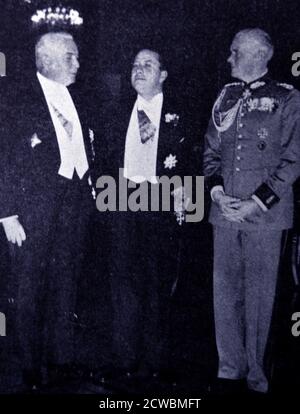 Black and white photograph of Count Galeazzo Ciano (1903-1944) in the Chancellery in Berlin, photographed with Konstantin von Neurath (1873-1956), German minister of foreign affairs, and German Marshal Werner von Blomberg (1878-1946). Stock Photo