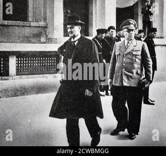 Black and white photo of Neville Chamberlain (1869-1940), British Prime Minister, arriving in Munich for the Munich Conference. Stock Photo
