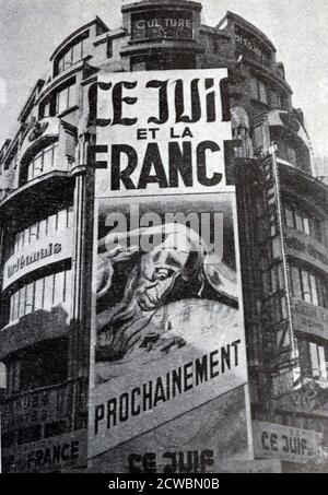 Black and white photograph of World War II (1939-1945); 'What we saw during the Occupation of Paris in the streets and on the walls'. An anti-Jewish poster depicting Jews as scapegoats. Stock Photo