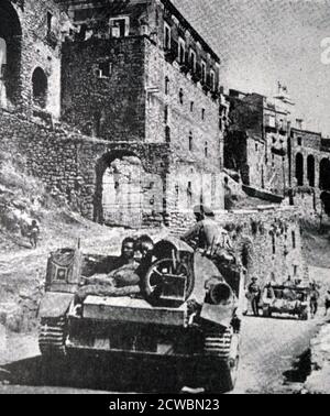 Black and white photograph of World War II (1939-1945) showing British tanks entering Messina, where they joined forces with American troops on 17 August 1943. Stock Photo