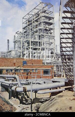 Stanlow oil refinery in Ellesmere Port, North West England, in 1954. Until 2011 it was owned by Royal Dutch Shell. The refinery is situated on the south bank of the Manchester Ship Canal, which is used to transport seaborne oil for refining and chemicals for Esso and Shell. Stock Photo