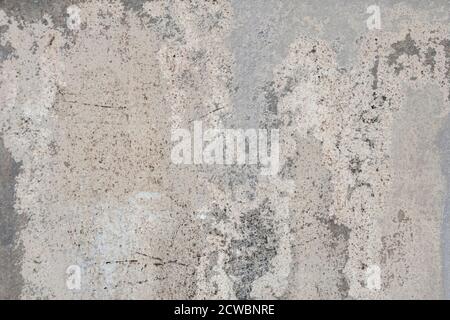 Abstraction pastel background with shades of beige, brown, gray. Oxidized metal, enamel, rusty metal texture, surface with rust streaks and scratches Stock Photo