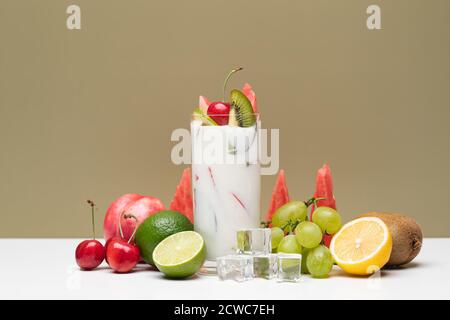 Fruit yoghurt cup and a variety of fruits Stock Photo