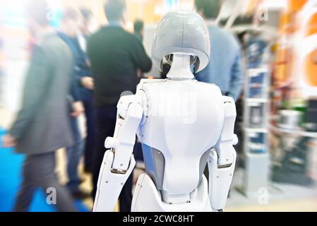 Information robot on a blurred background exhibition Stock Photo