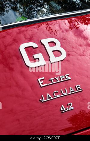 1960's Red Jaguar E-Type closeup rear boot identification nomenclature 'E Type Jaguar 4.2 GB' is a British sports car manufactured by Jaguar Cars Ltd Stock Photo