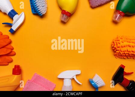 means for cleaning the house on a yellow background. place for text. Stock Photo