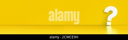 question mark in front of a yellow color wall background. Business Stock Photo