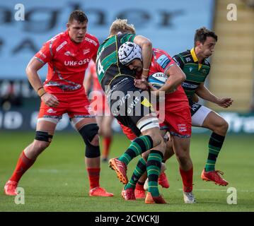 Curtis Langdon of Northampton Saints is tackled during the Gallagher ...