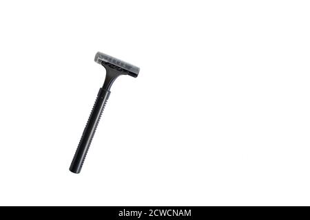 Disposable black razor isolated on white background Stock Photo