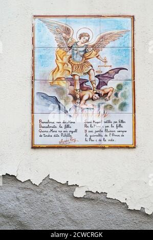 BARCELONA, SPAIN - JUNE 2, 2013: Picture of a mosaic depicting the angel and devil. An image of specially painted tiles and pieces of glaze on the Stock Photo