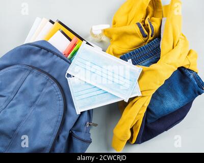 New school set including face mask, sanitizer Stock Photo