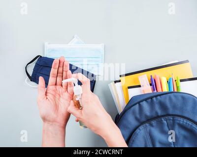 New school set including face mask, sanitizer Stock Photo