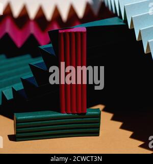 Modern multicolored composition of bars of clay and fans of cardboard. Stylish geometric concept. Stock Photo