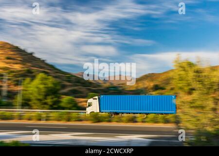 Truck with enclosed semi-trailer for transport of the automotive industry Stock Photo